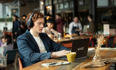 WH-1000XM4 on a man in a restaurant